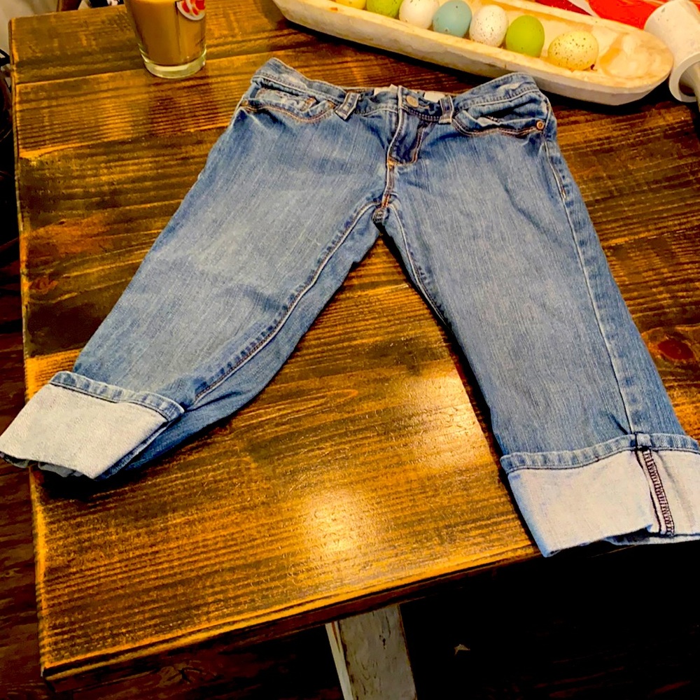 Girl’s distressed Capri length denim shorts